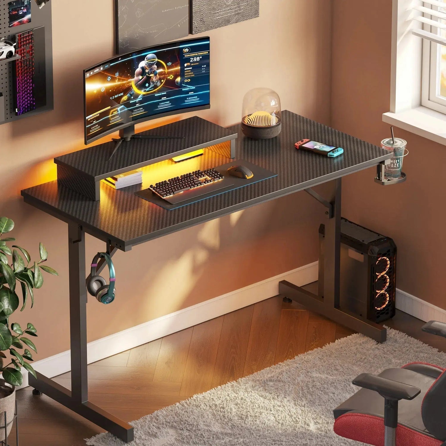 A gamer's desk setup featuring a carbon fiber top, an ergonomic monitor riser, and warm LED backlighting for comfortable gaming.