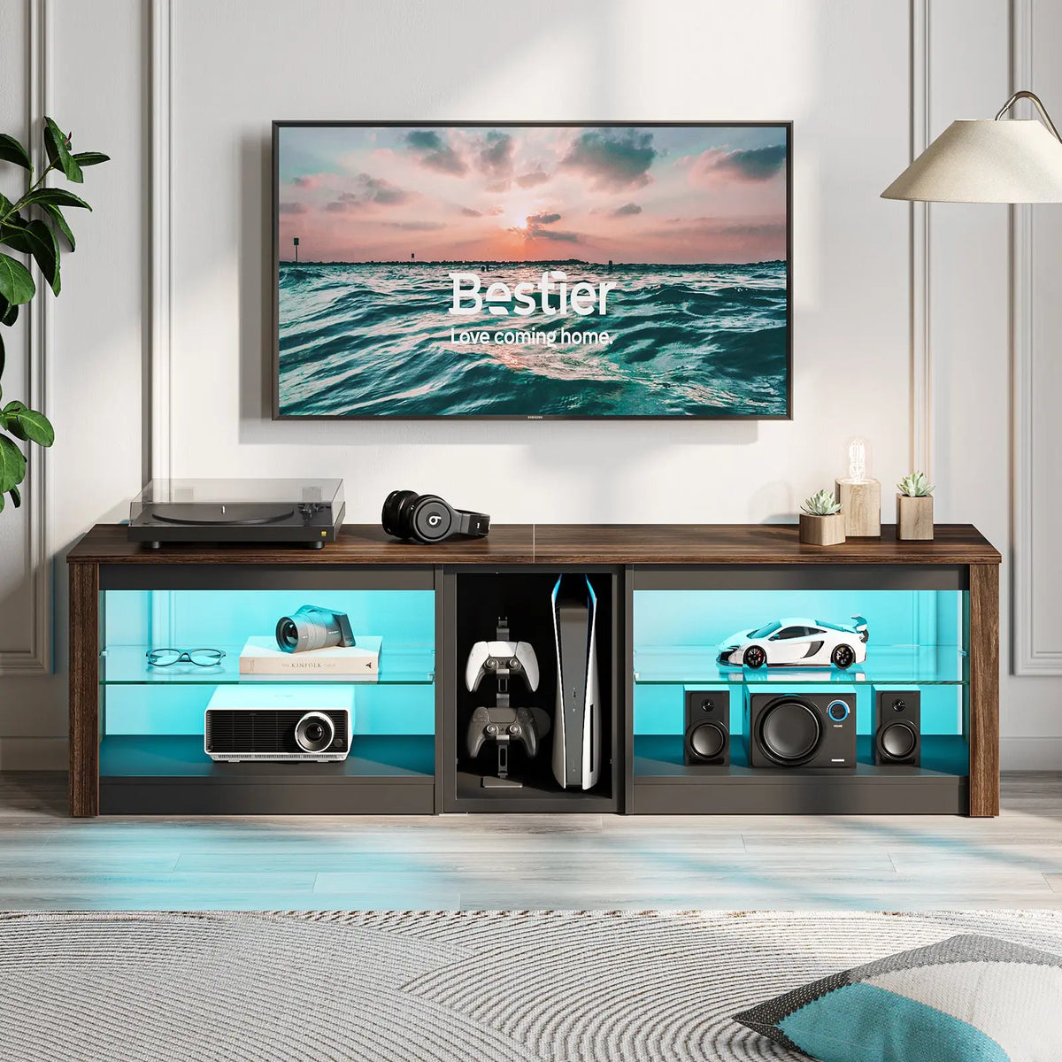 Bestier 63-inch gaming entertainment center with PS5, LED lights & glass shelves.