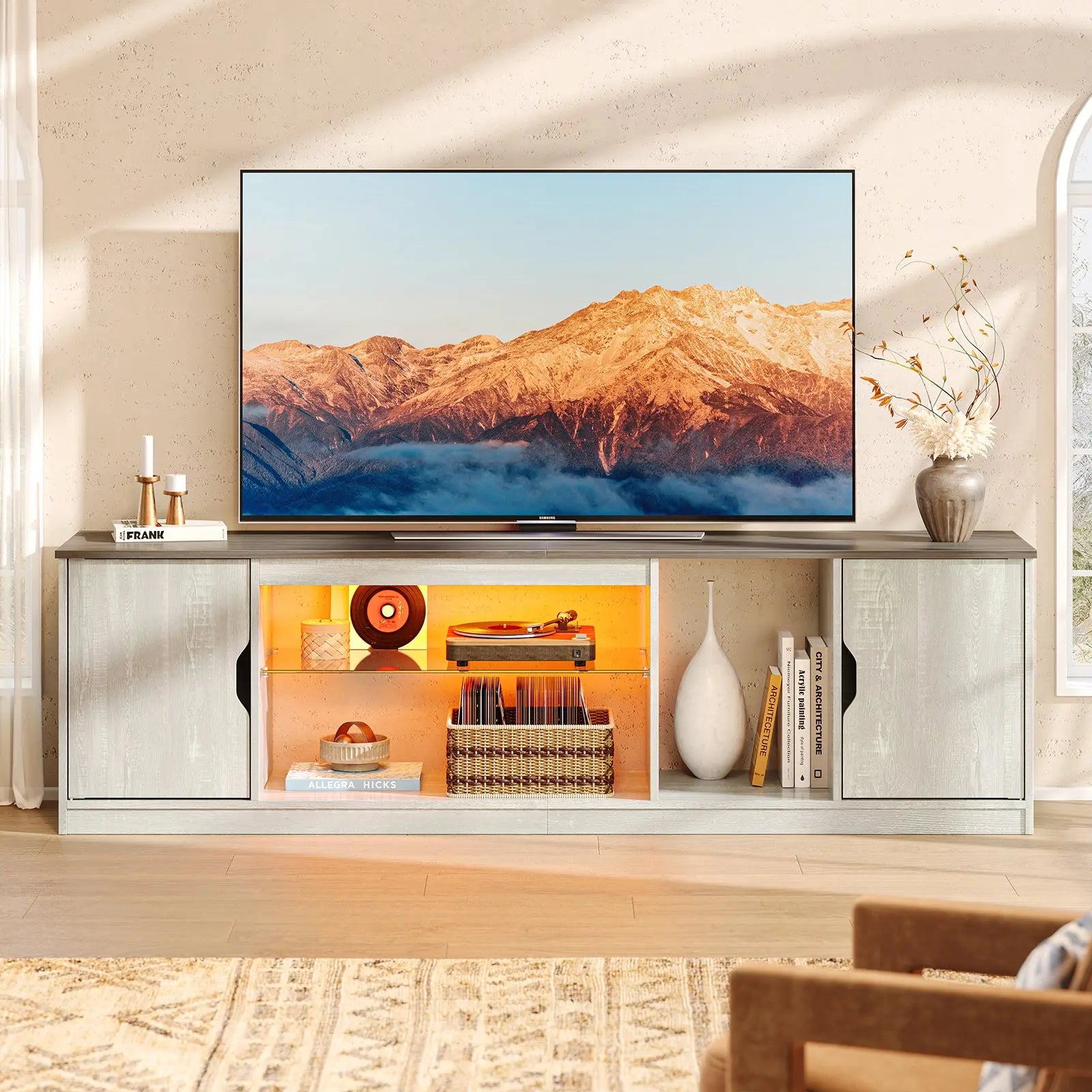 Bestier 70" TV stand with ambient LED lighting, open storage, and modern wood finish.