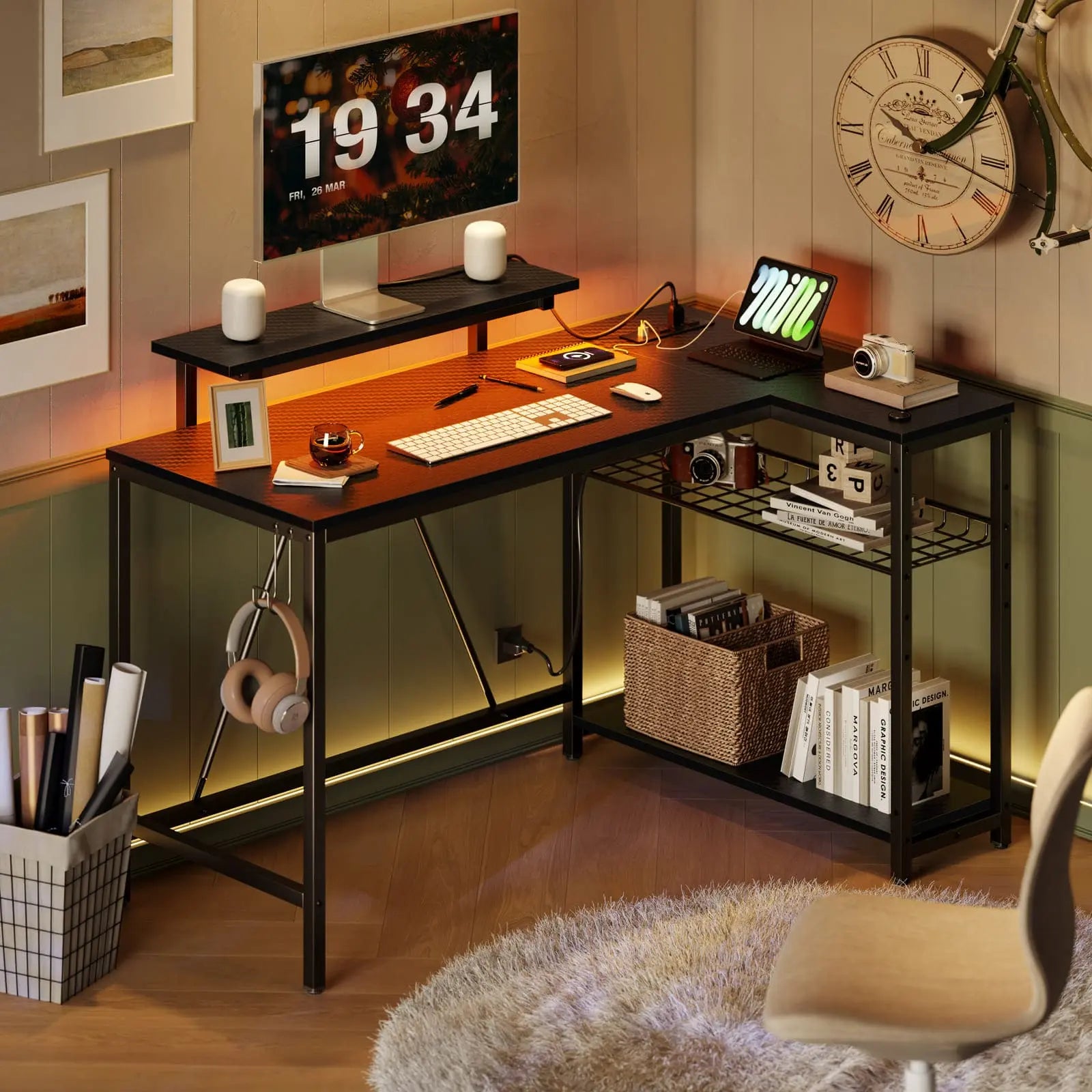 a computer on the balck led l shaped gaming desk