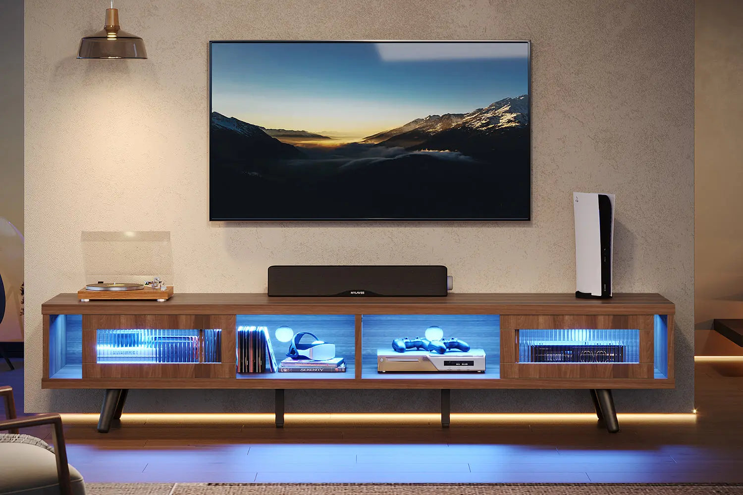 Gaming entertainment center featuring cool blue LED lights, PS5 console, and soundbar for an immersive media experience.