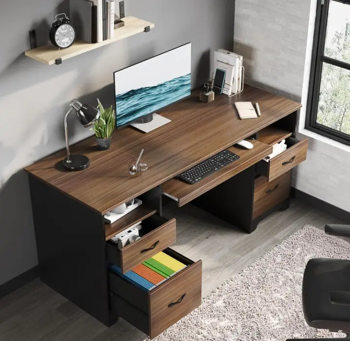 a brown computer desk with drawers in a room