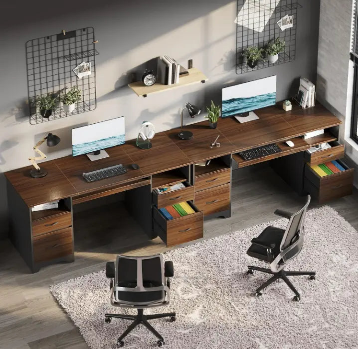 there are two brown computer desks in a room