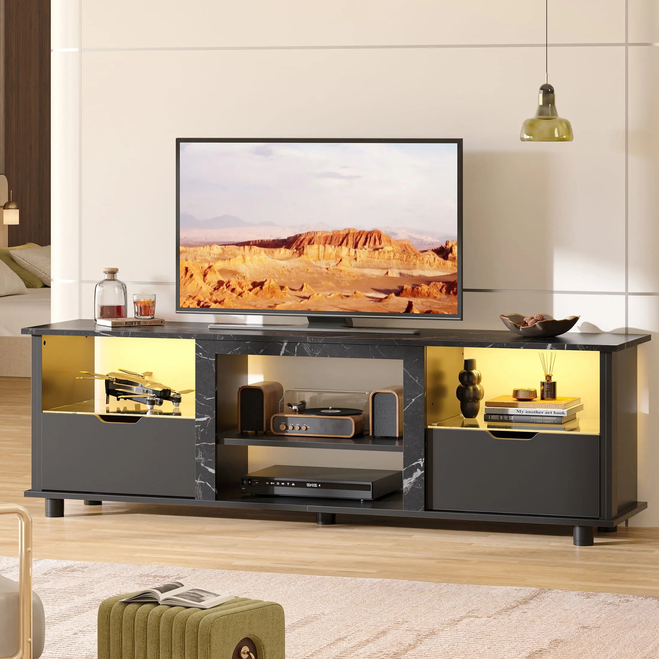 the black marble gaming entertainment center with drawers in a room