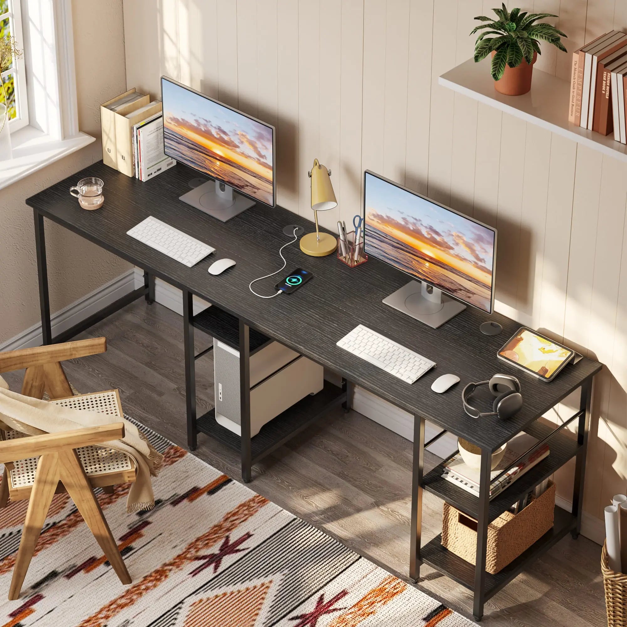 the black two person l shaped computer desk in a room