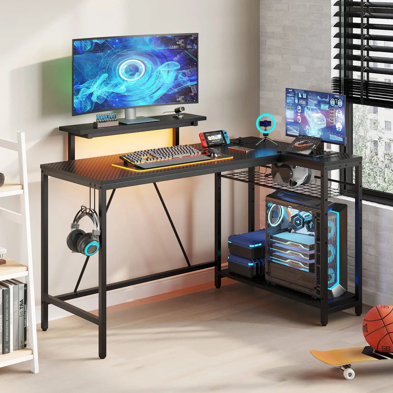 the black l shaped gaming desk with usb ports in a room