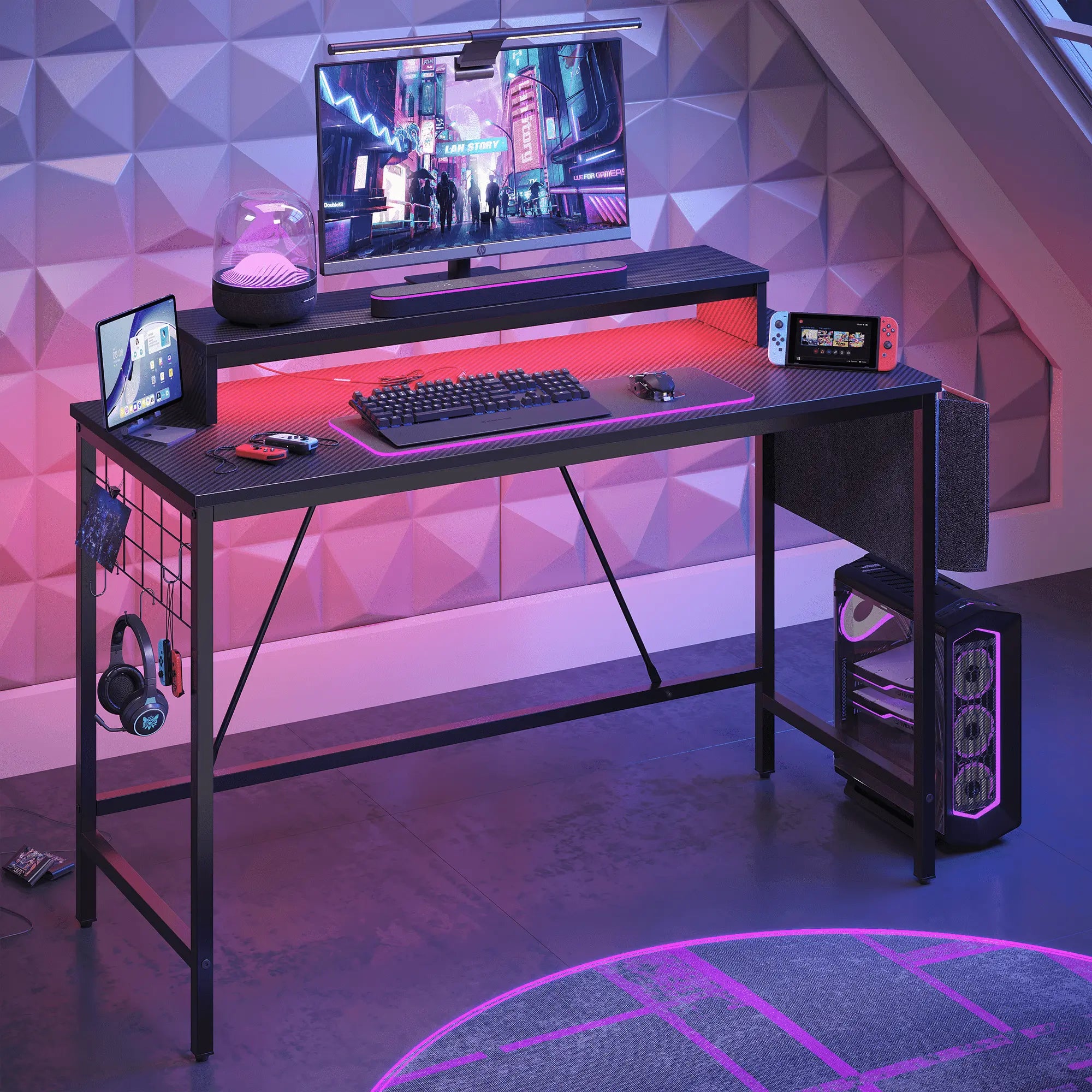 the led gaming desk with monitor stand in a room