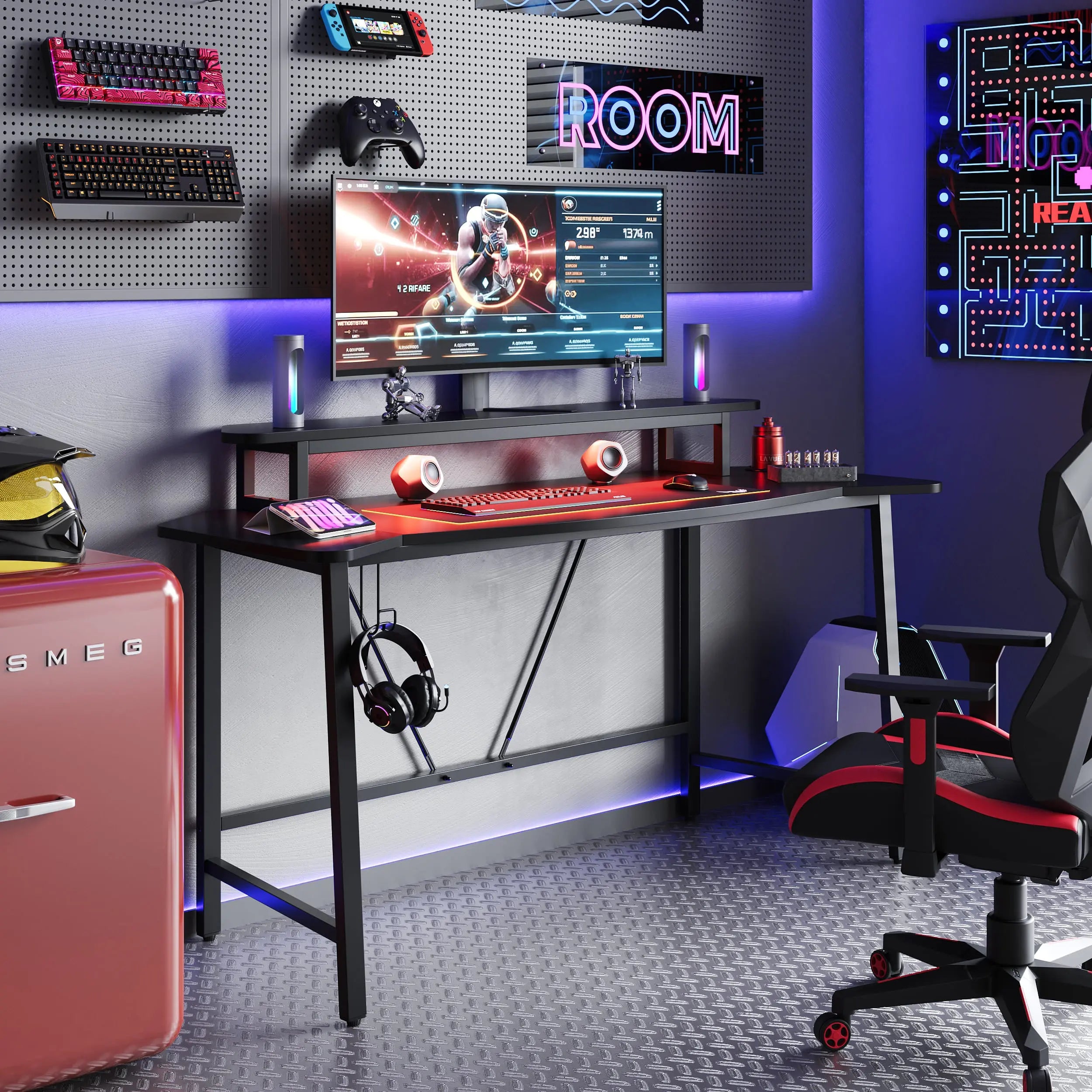 the black led gaming desk with monitor stand and headphone hook in a gaming room