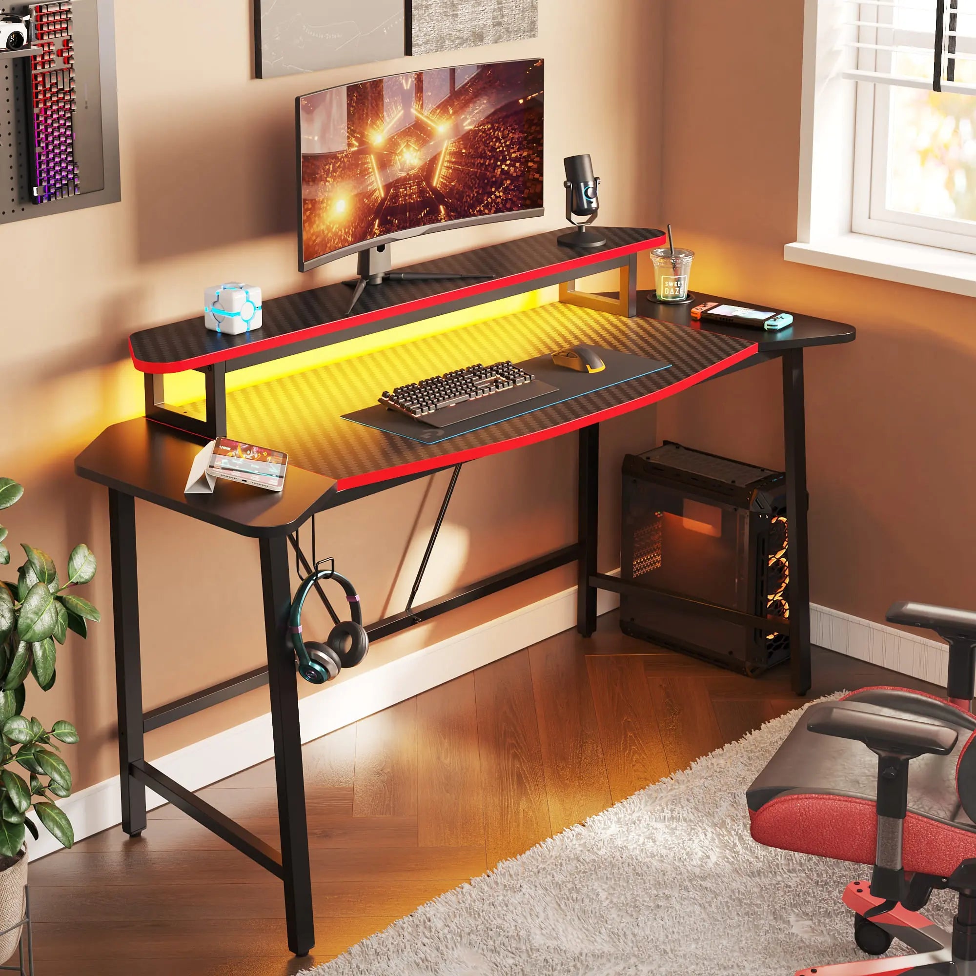 the black fiber led gaming desk with monitor stand and headphone hook