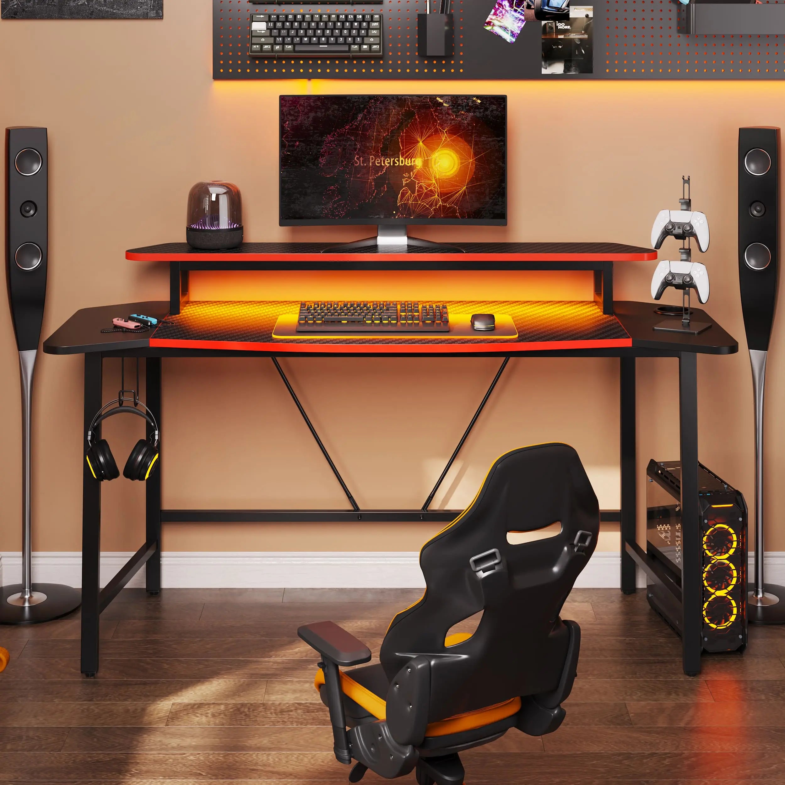 the black fiber led gaming desk with monitor stand and headphone hook in a room