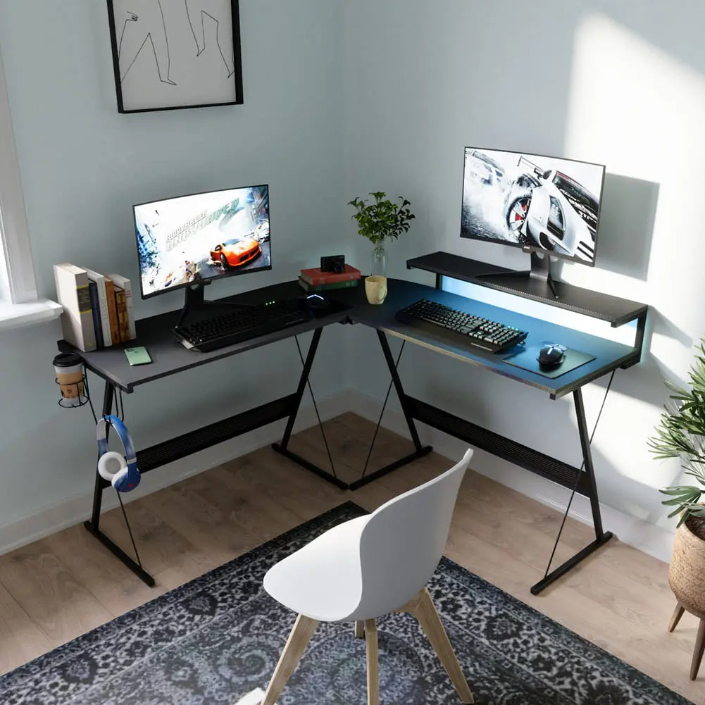 the l shaped gaming desk with cup holder in a room