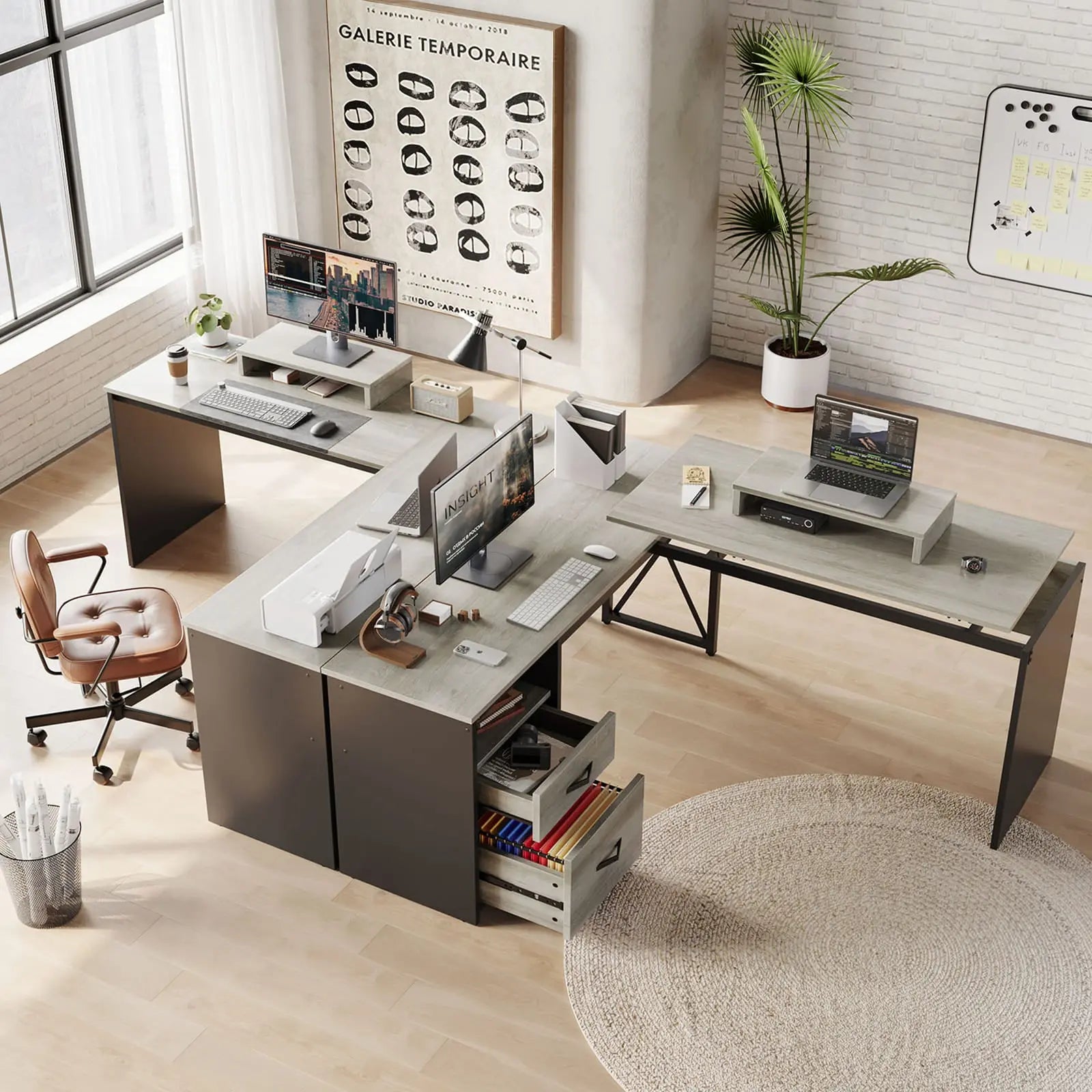 the light grey lift top l shaped desk in a home office