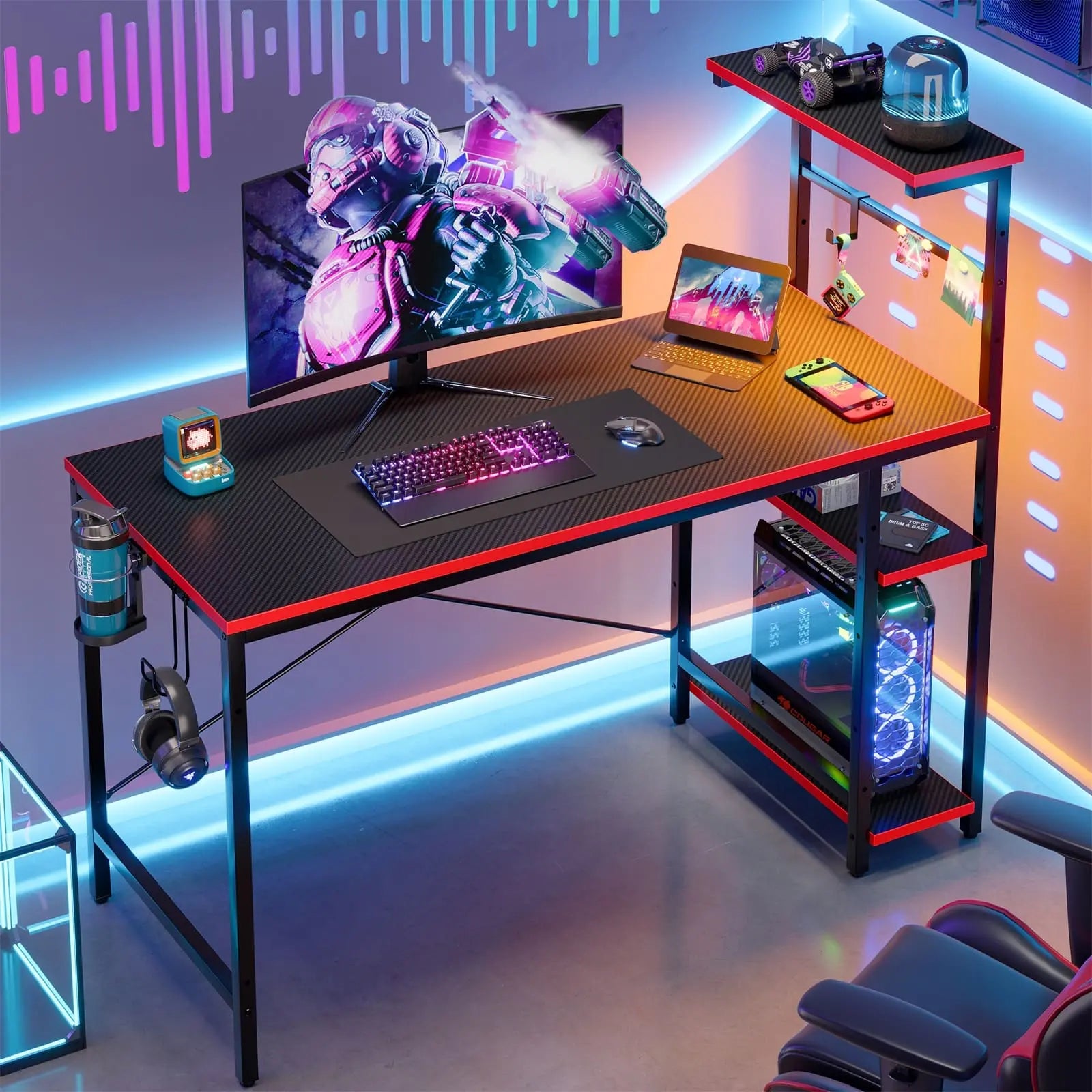 the black carbon fiber retangular gaming desk with led lights in a gaming room